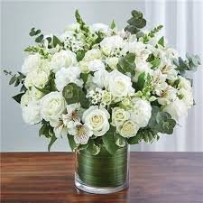 ALL WHITE SYMPATHY FLOWERS